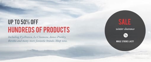Banner with text "UP TO 50% OFF HUNDREDS OF PRODUCTS" and a sale sticker for "winter clearance" mentioning brands like Fjallraven, Le Chameau, Purdey, Beretta, and others.