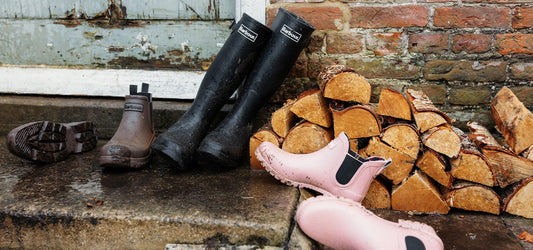 Pairs of Wellington Boots on Doorstep