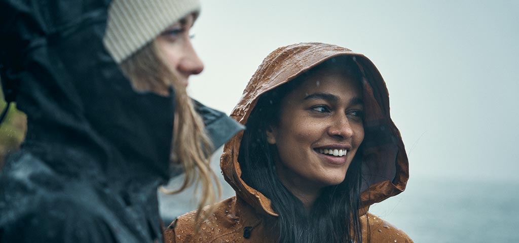 Two Women wearing Fjallraven coats in cold weather