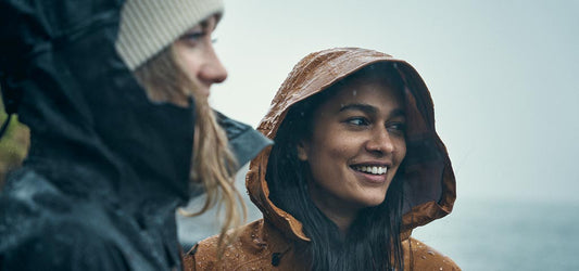 Two Women wearing Fjallraven coats in cold weather