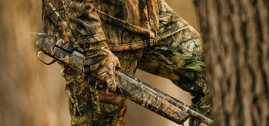 Hunter With Gun Wearing Full Camouflage Camo Clothing