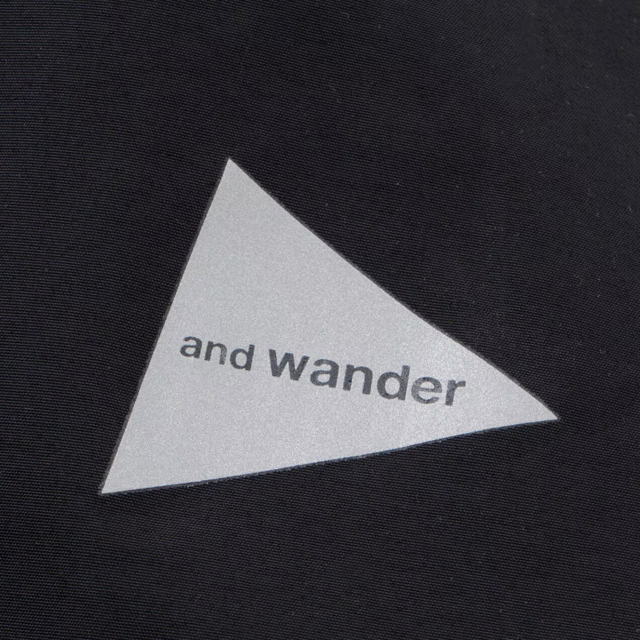 And Wander 2.5L Hiker Rain Jacket Black - The Sporting Lodge