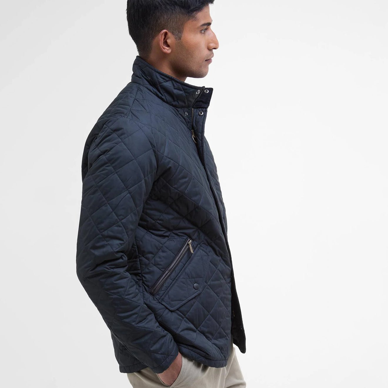 Barbour Chelsea Sportsquilt Jacket Navy side profile view showing quilted stitching and tailored shape